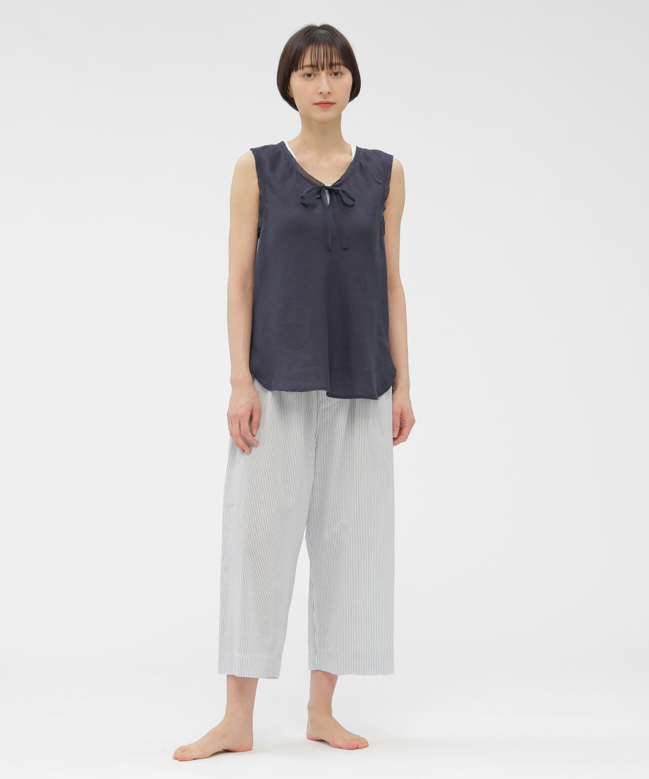 身長168cm　B76 W58 H86 着用サイズ：F