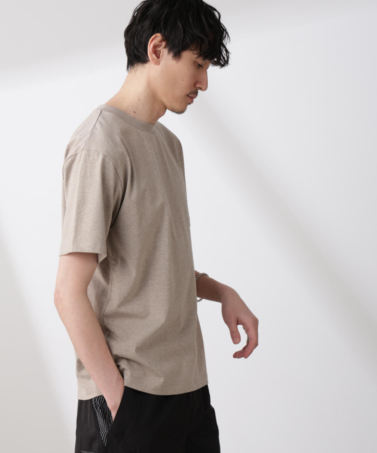 「NJ/CLUB」 ISLANDCLUBプリント Tシャツ