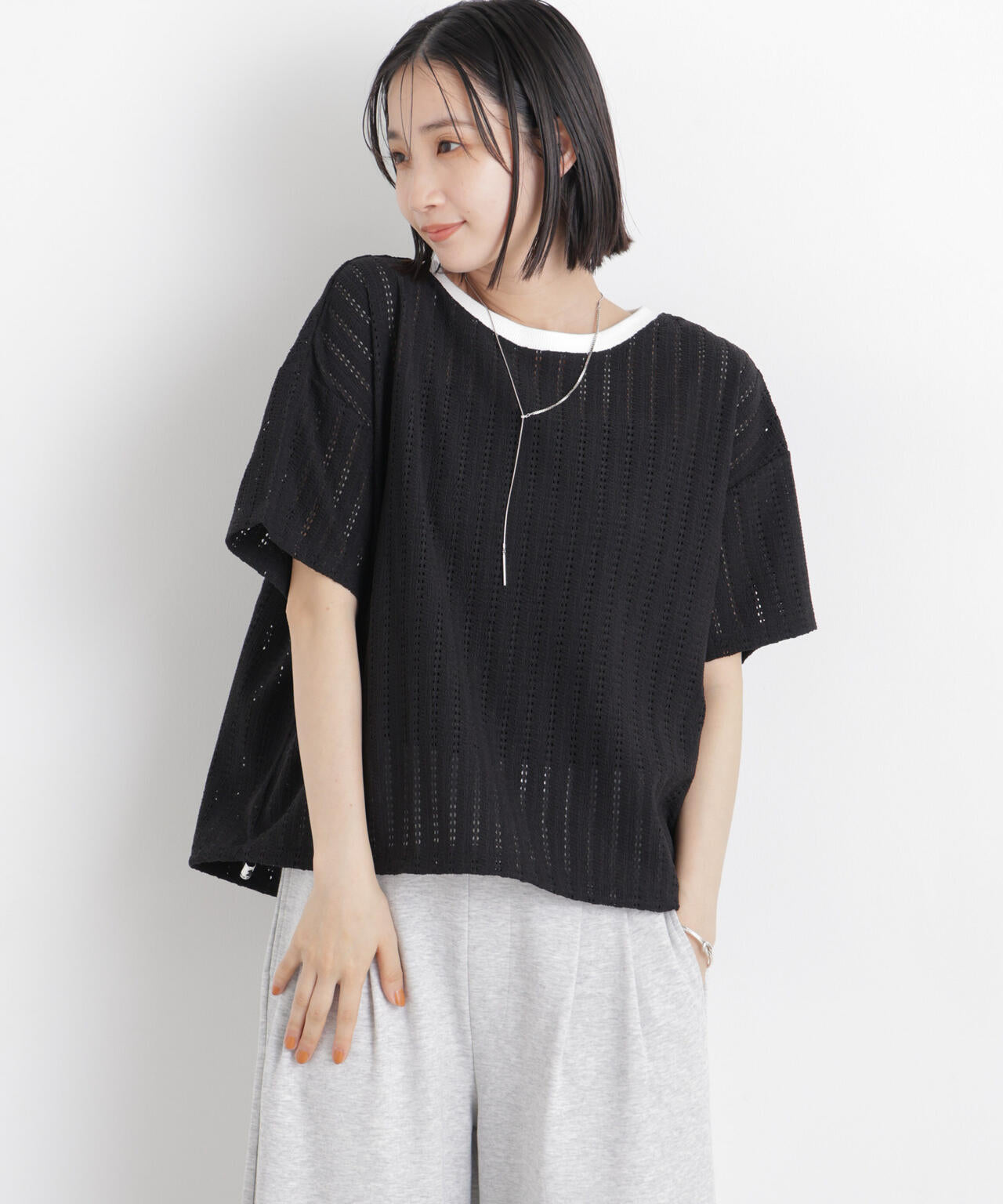 カットジャガードドロストヘムトップス