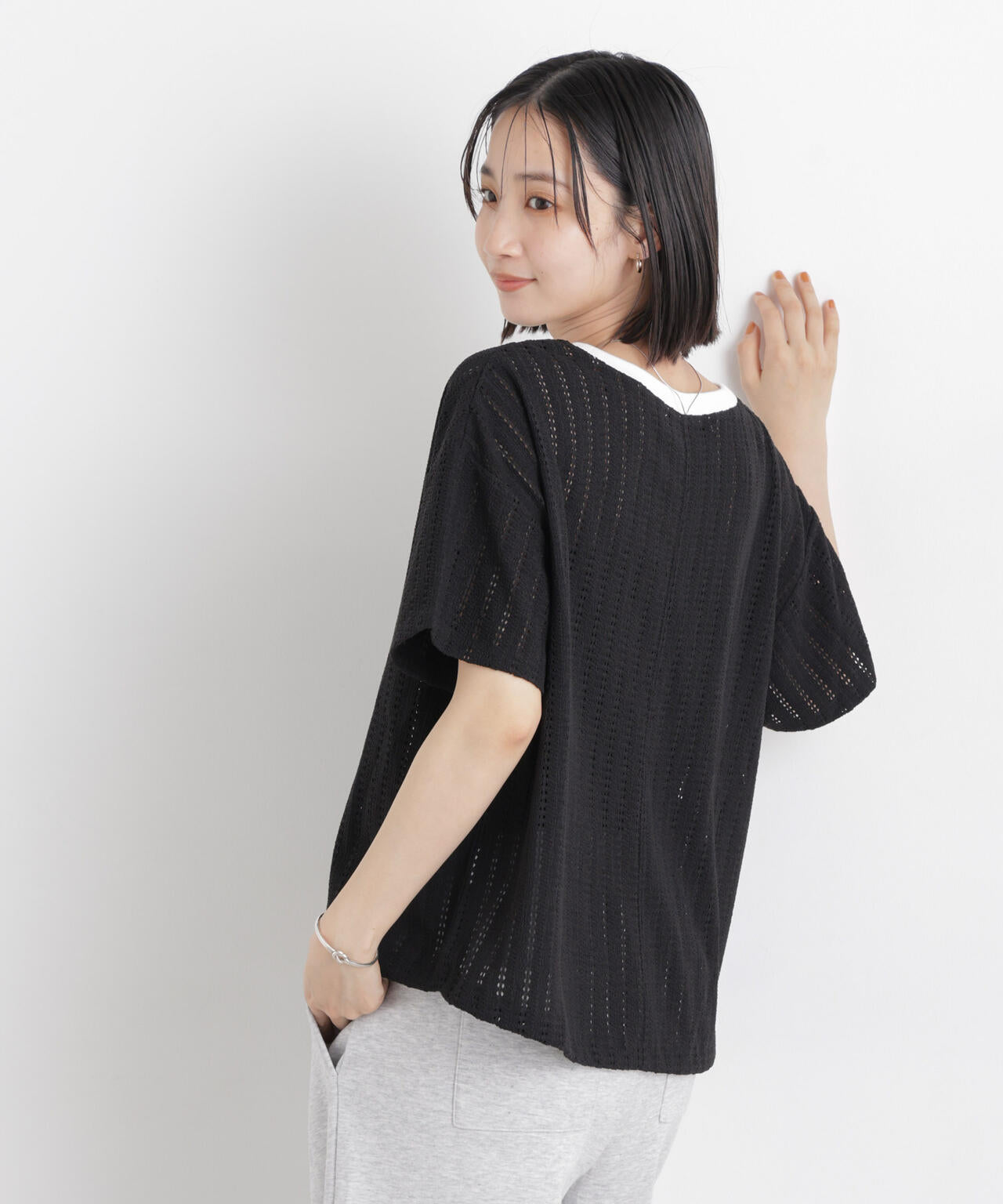 カットジャガードドロストヘムトップス