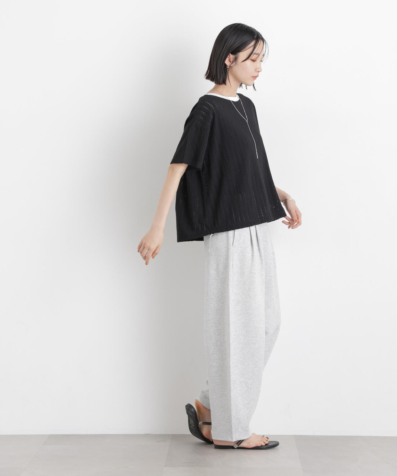 カットジャガードドロストヘムトップス