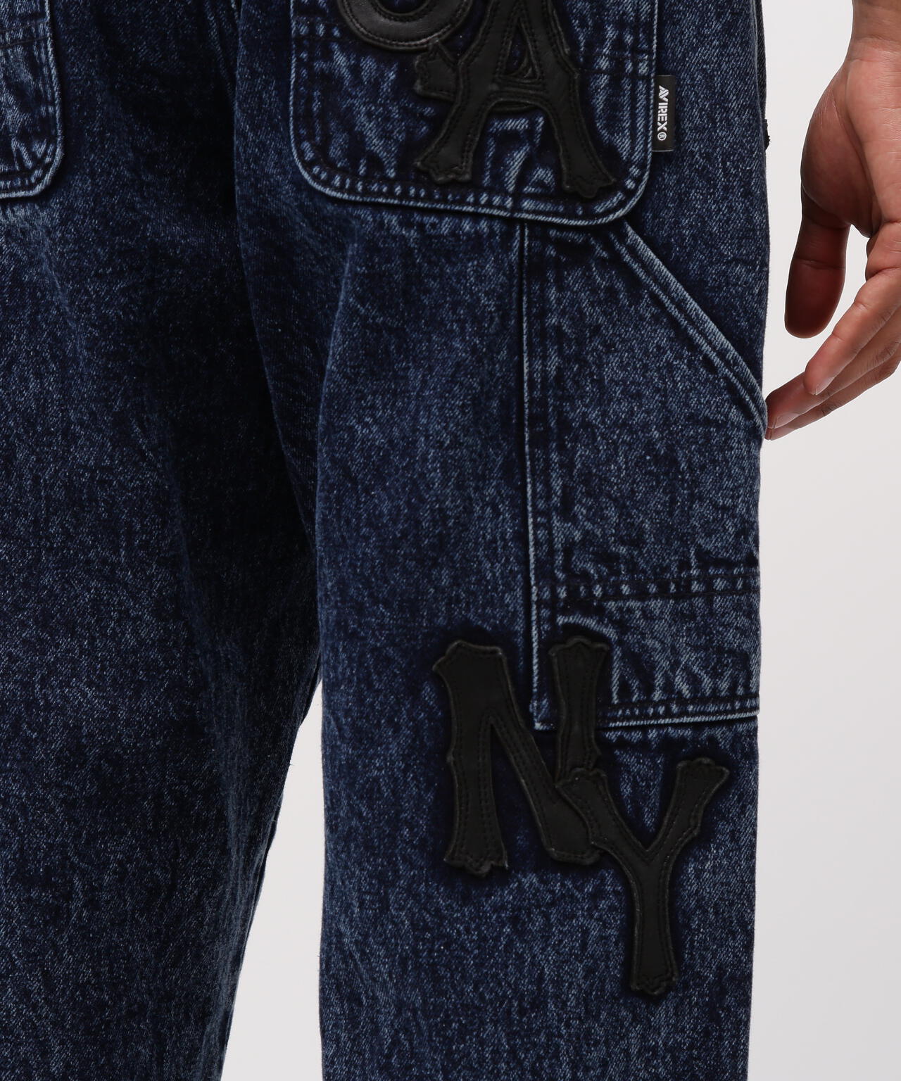 LEATHER PATCH DENIM PANTS