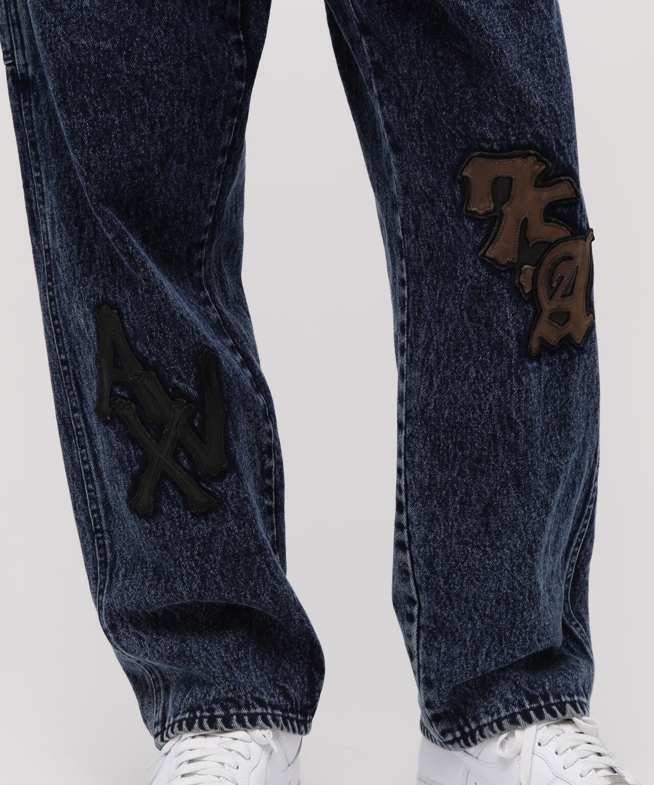 LEATHER PATCH DENIM PANTS