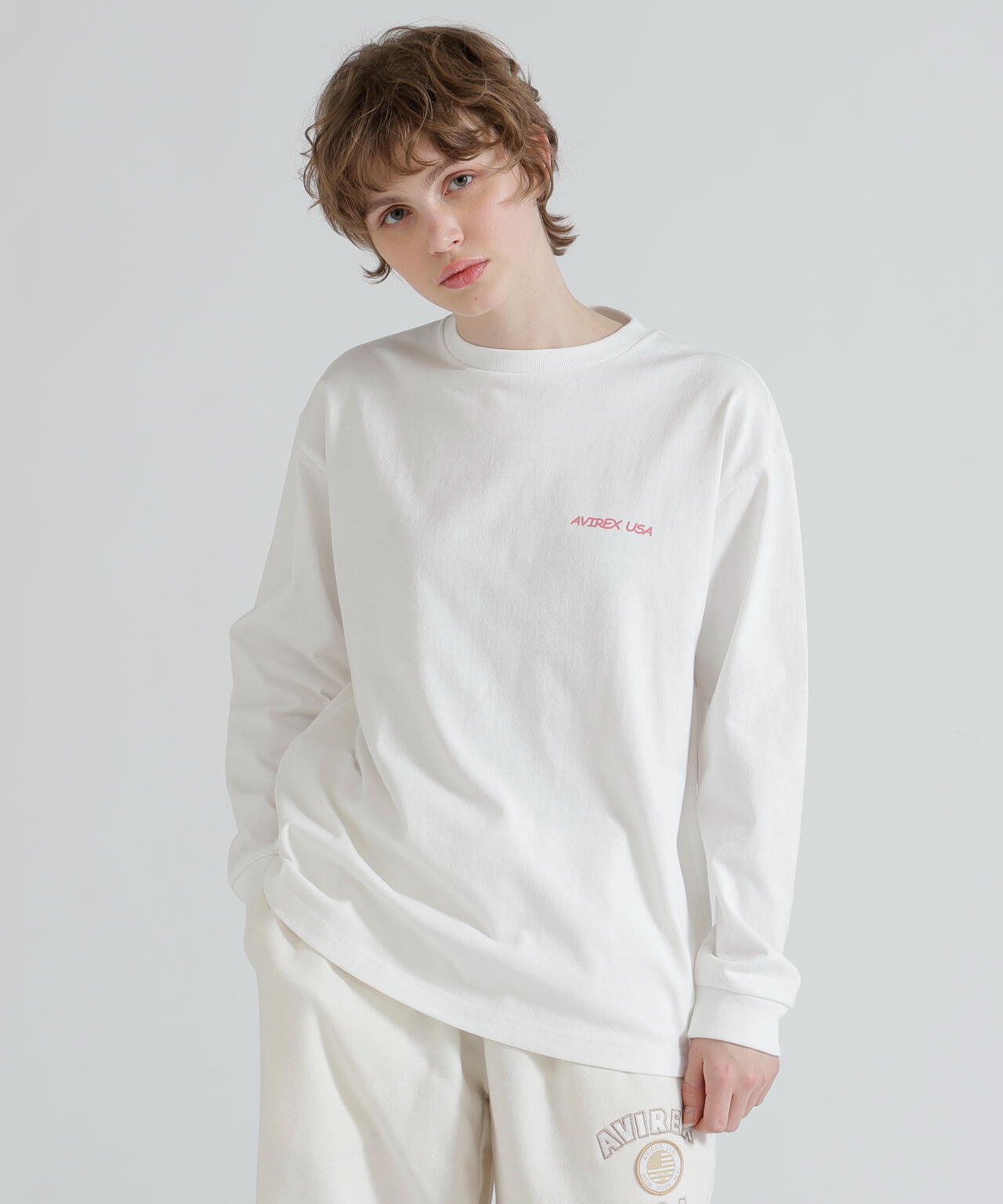 《WOMAN》RANDOM LOGO TOMCAT T-SHIRT