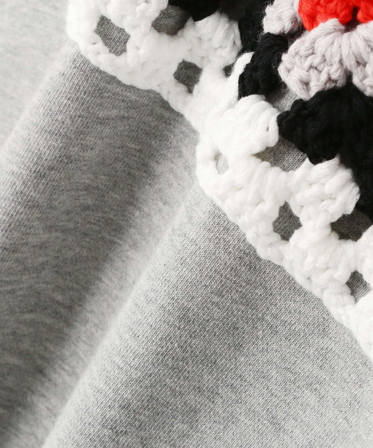 DISCOVERED（ディスカバード）別注CROCHET SLEEVE SWEAT(UNISEX)