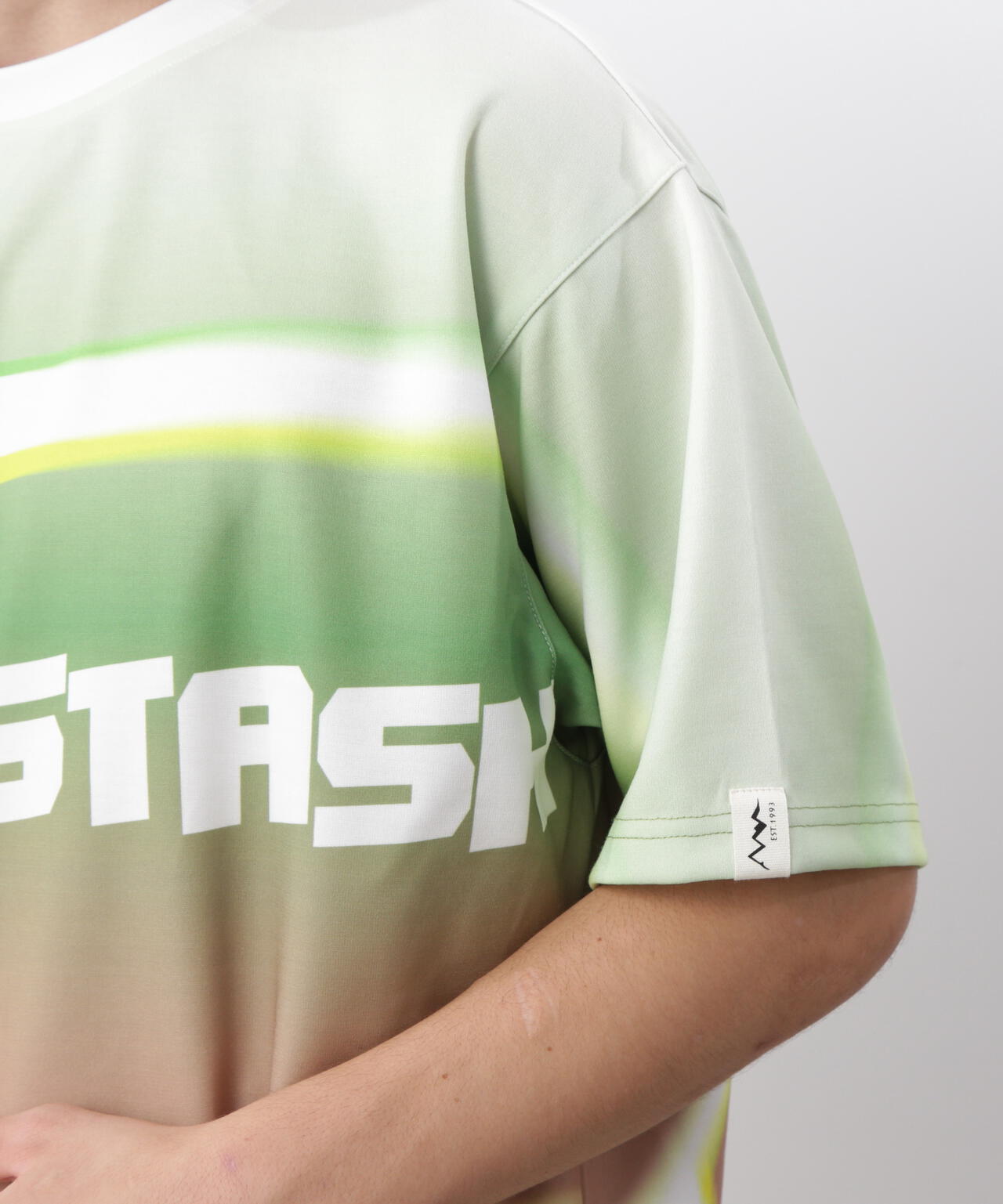 MANASTASH/マナスタッシュ/ALLOVER GRADIENT LOGO TOP